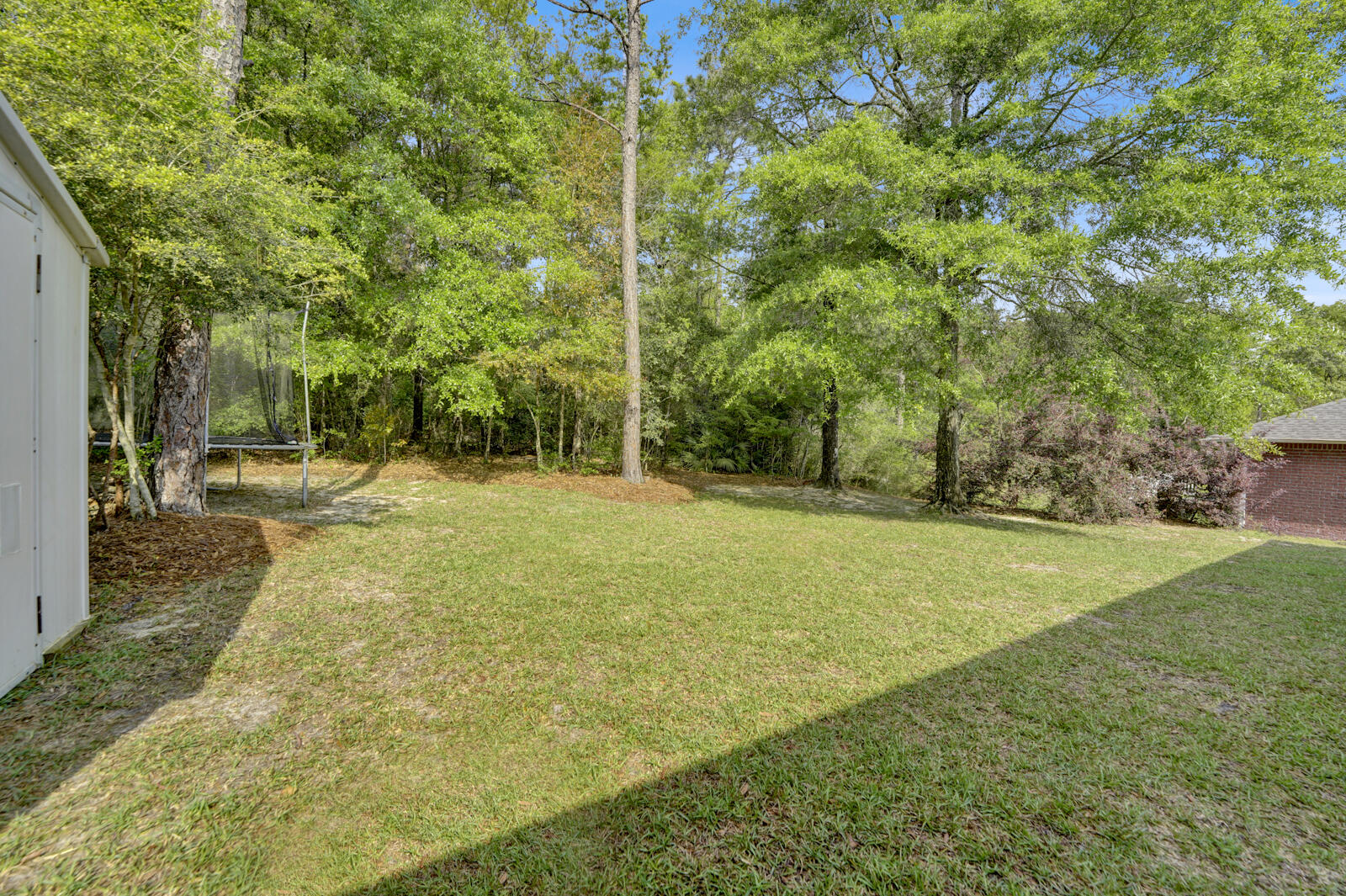 304 Greyfox Circle Crestview, FL 32536 - Photo 40 of 49 a view of a field with trees
