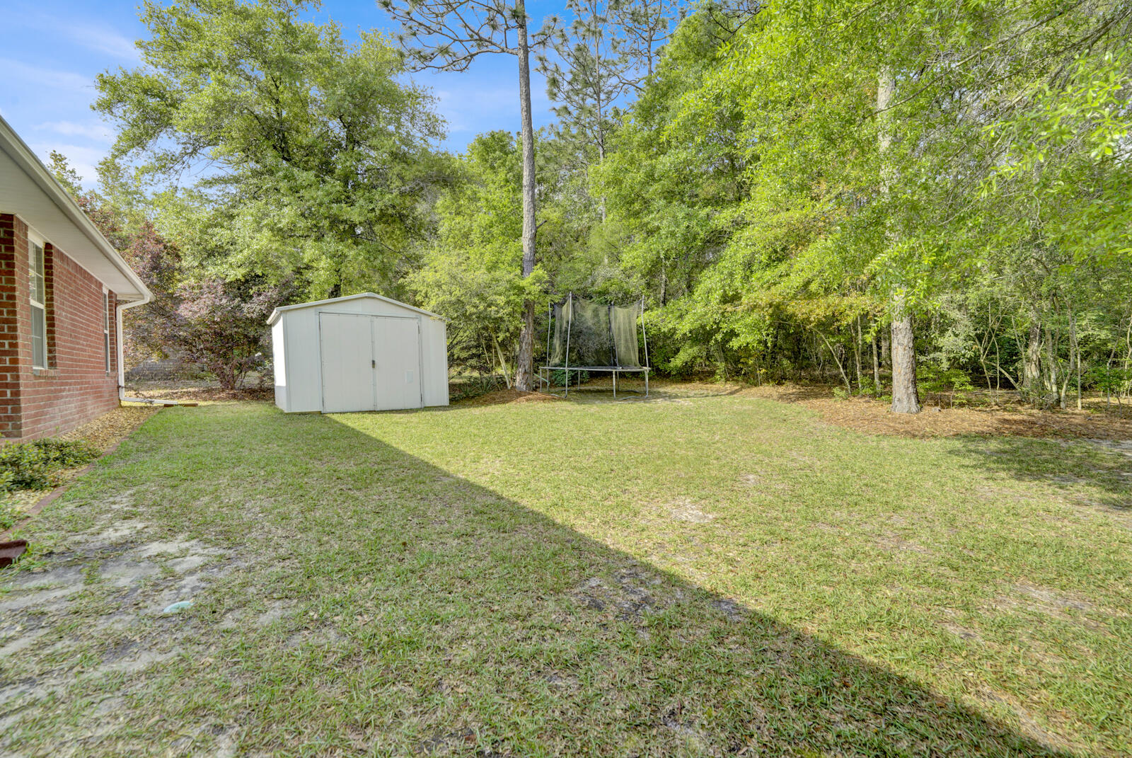 304 Greyfox Circle Crestview, FL 32536 - Photo 41 of 49 a view of a field with trees