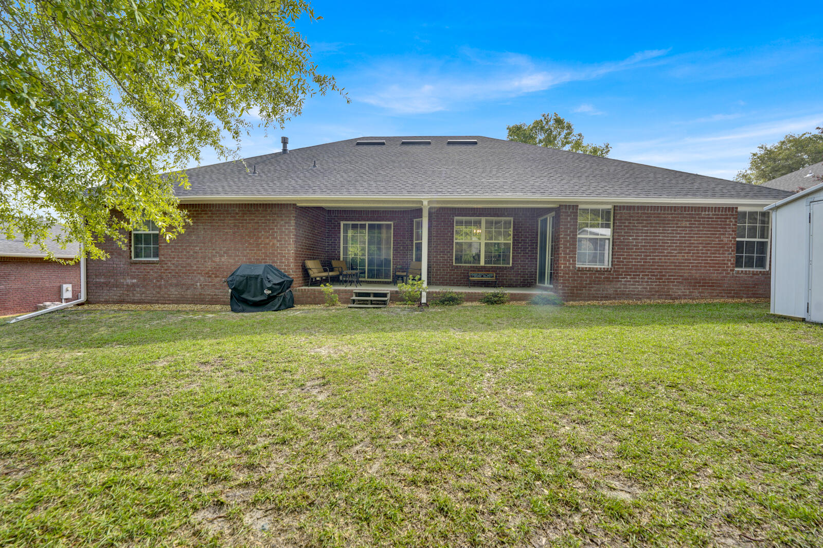 304 Greyfox Circle Crestview, FL 32536 - Photo 42 of 49 a front view of a house with a yard