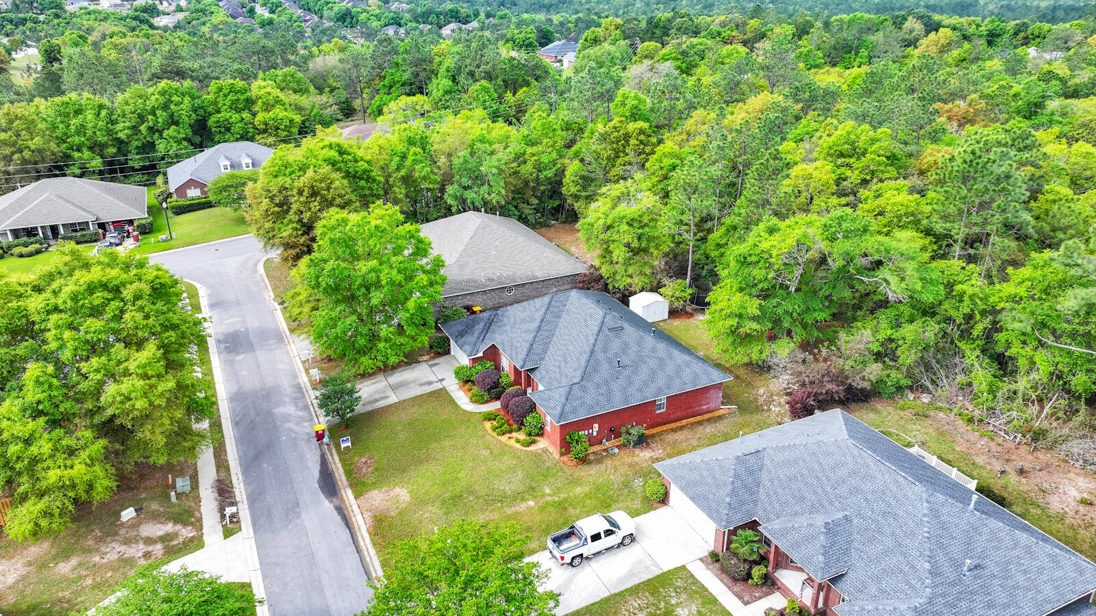 304 Greyfox Circle Crestview, FL 32536 - Photo 43 of 49 an aerial view of a house with garden space and street view