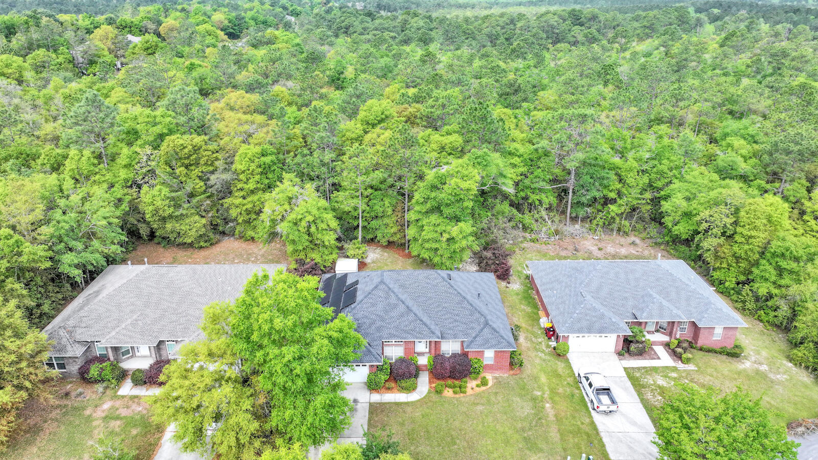 304 Greyfox Circle Crestview, FL 32536 - Photo 45 of 49 an aerial view of residential houses with outdoor space and trees