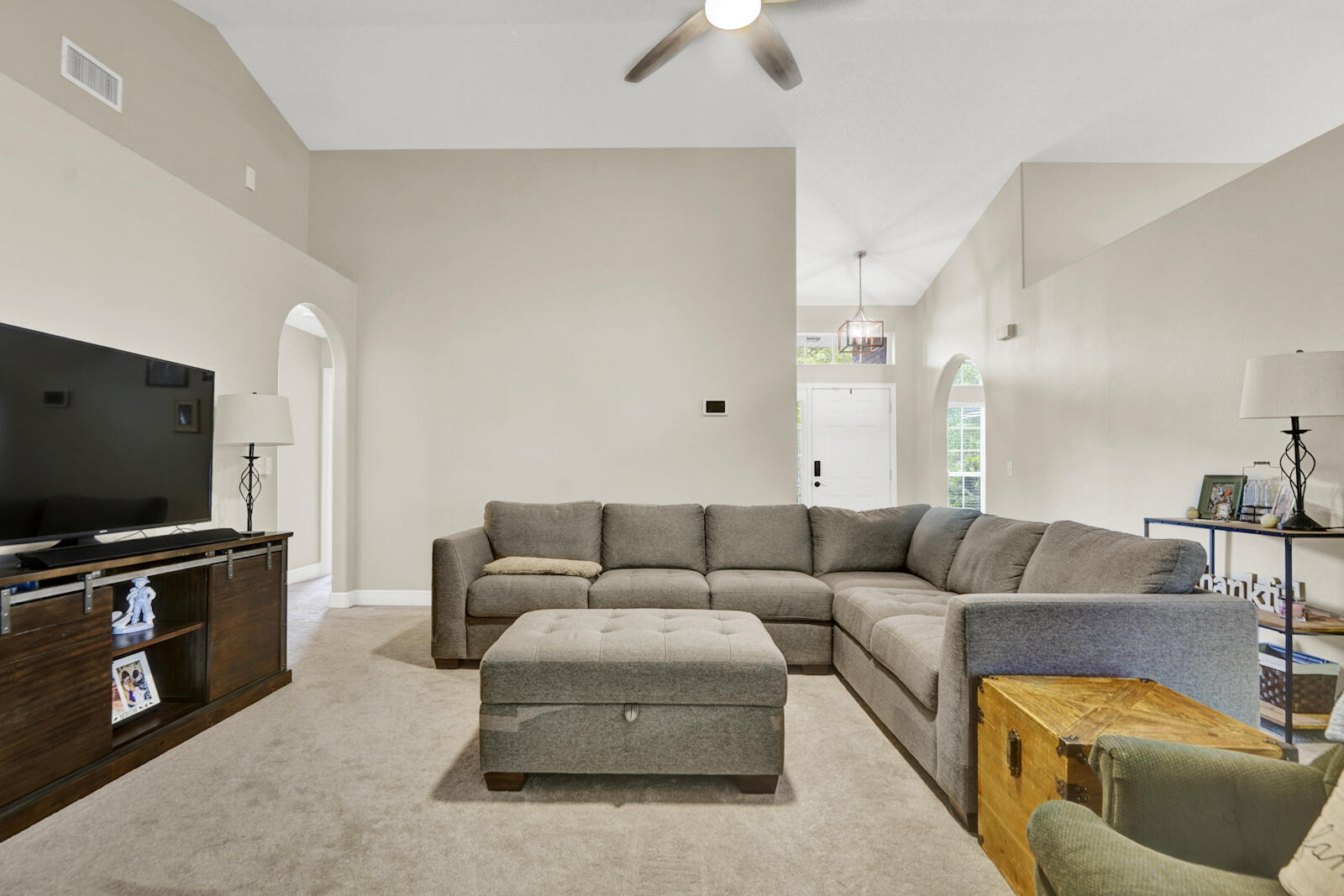 304 Greyfox Circle Crestview, FL 32536 - Photo 6 of 49 a living room with furniture and a flat screen tv