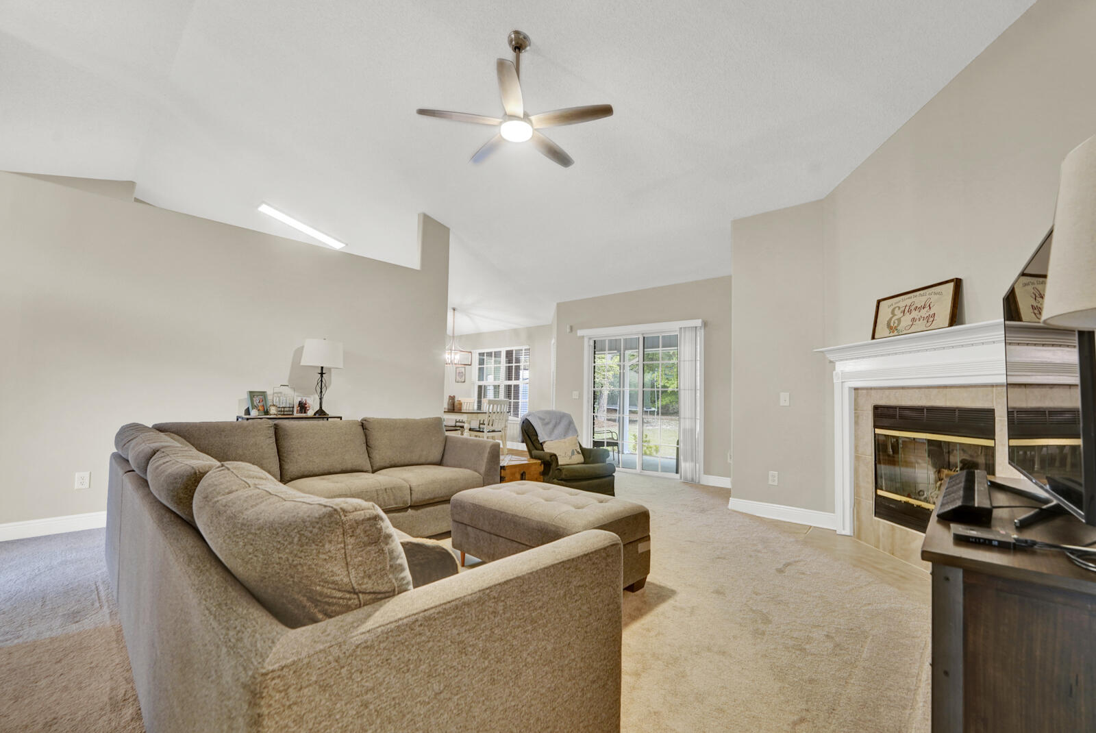304 Greyfox Circle Crestview, FL 32536 - Photo 7 of 49 a living room with furniture and a fireplace