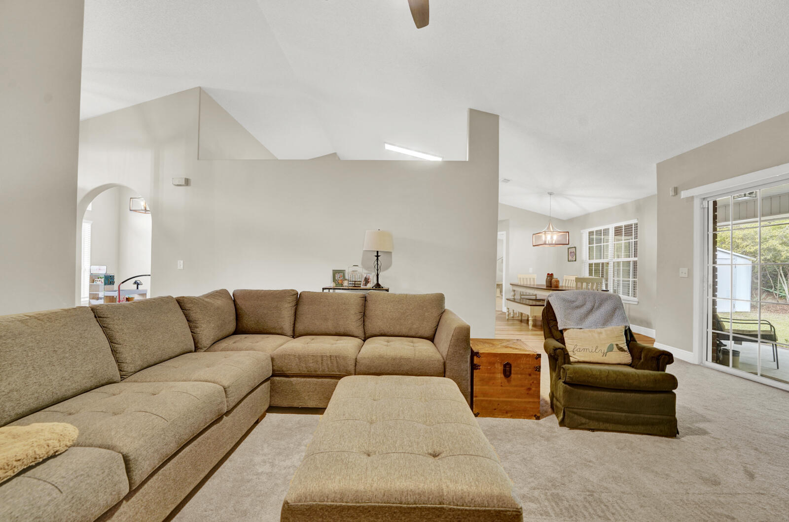 304 Greyfox Circle Crestview, FL 32536 - Photo 8 of 49 a living room with furniture and a large window