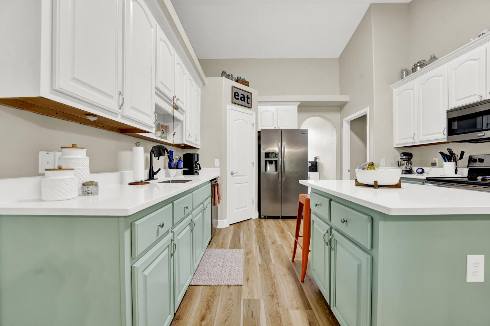 304 Greyfox Circle Crestview, FL 32536 - Photo 10 of 49 a kitchen with stainless steel appliances granite countertop a sink and a refrigerator