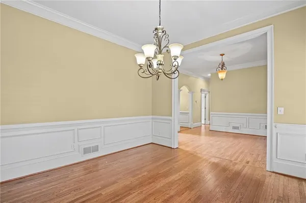 a view of a livingroom with wooden floor