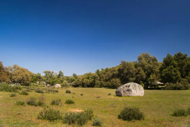 a view of a city with mountains in the background