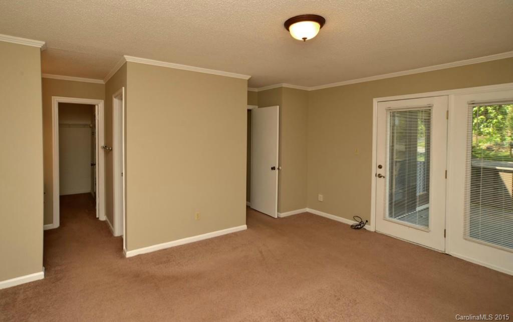 4731 Rounding Run Road Charlotte, NC 28277 - Photo 15 of 24 an empty room with closet area