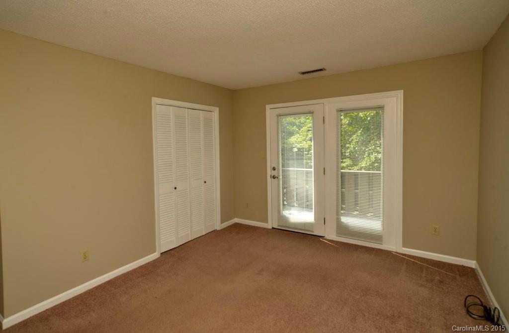 4731 Rounding Run Road Charlotte, NC 28277 - Photo 20 of 24 a view of an empty room with a window