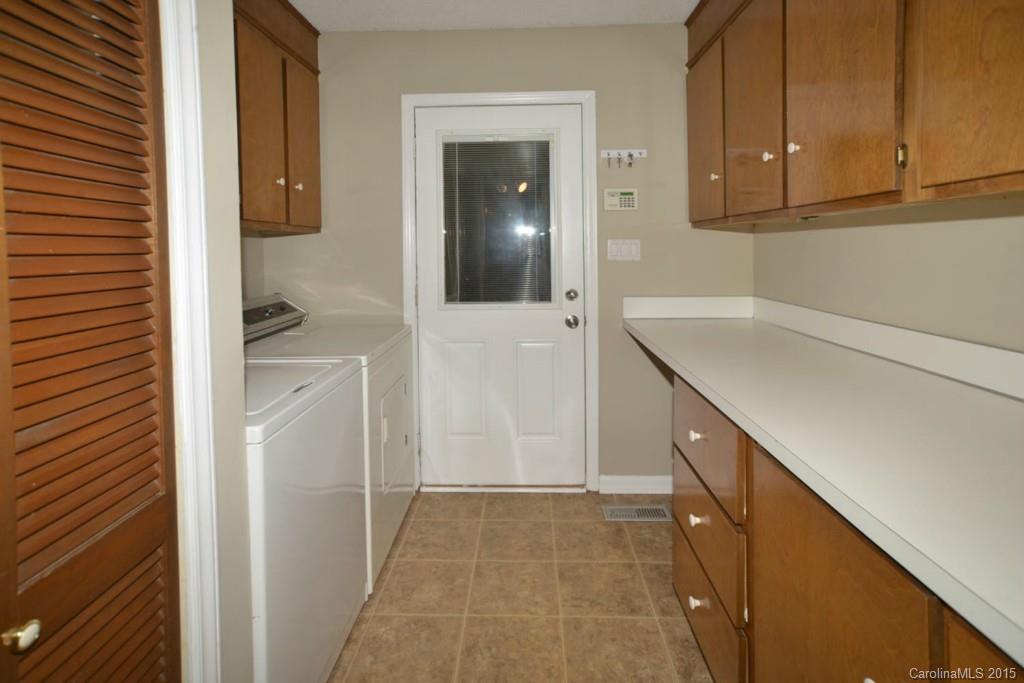 4731 Rounding Run Road Charlotte, NC 28277 - Photo 23 of 24 a bathroom with a sink and a mirror