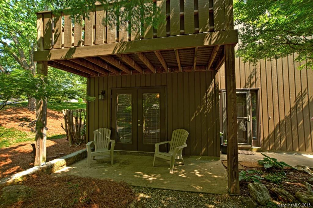 4731 Rounding Run Road Charlotte, NC 28277 - Photo 24 of 24 a backyard of a house with table and chairs
