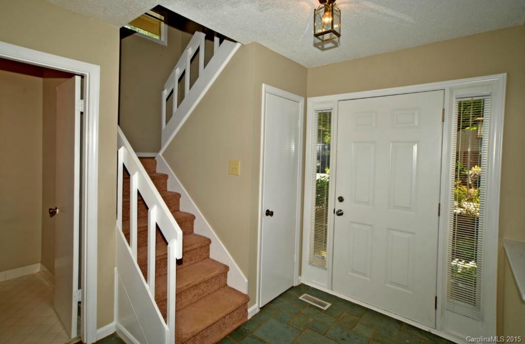 4731 Rounding Run Road Charlotte, NC 28277 - Photo 4 of 24 a view of an entryway with staircase