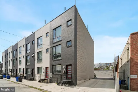 a front view of a building with street view