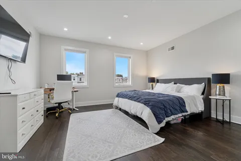 a kitchen with a sink and a refrigerator