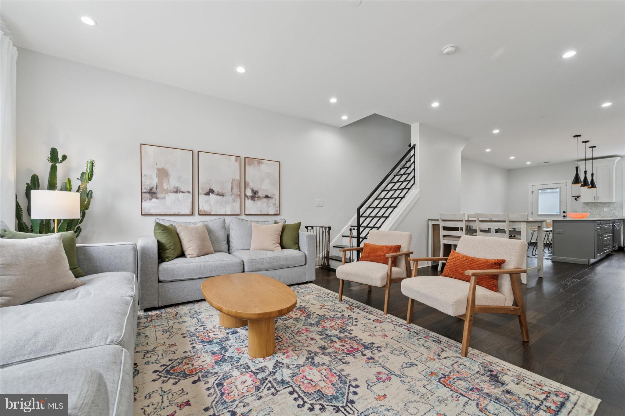 73 East Sharpnack Street Philadelphia, PA 19119 - Photo 4 of 50 a living room with furniture and a wooden floor