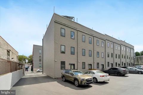 a car parked in front of a building