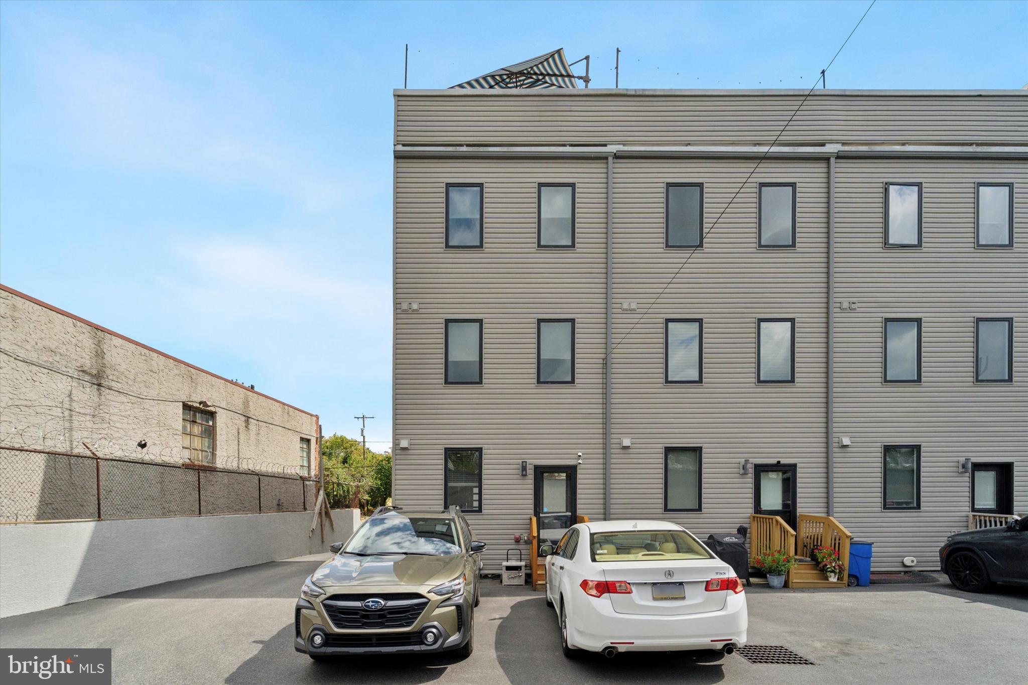 73 East Sharpnack Street Philadelphia, PA 19119 - Photo 43 of 50 a car parked in front of a building