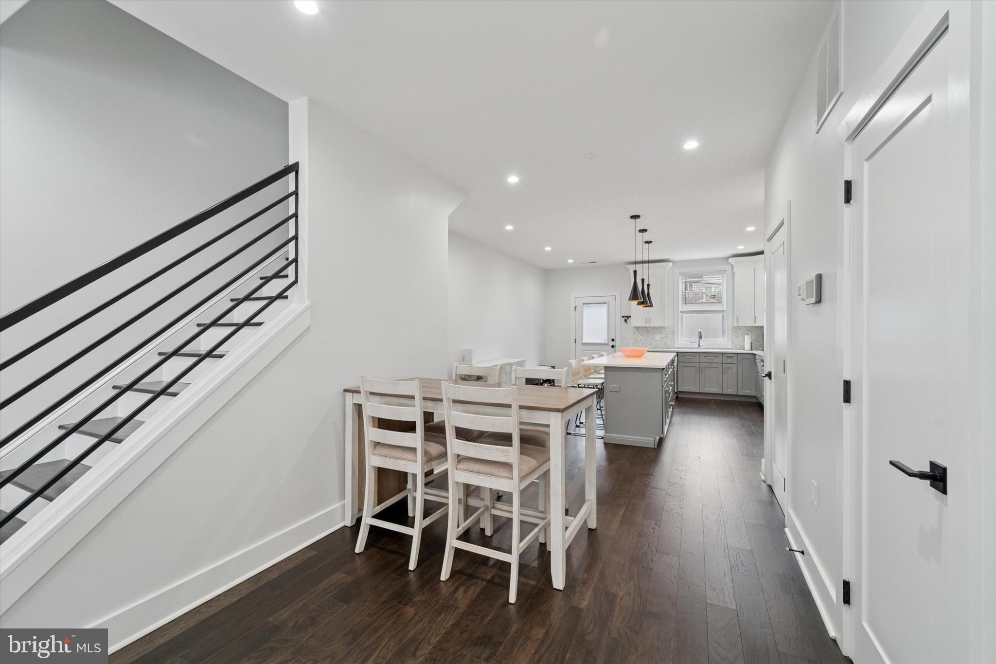73 East Sharpnack Street Philadelphia, PA 19119 - Photo 5 of 50 a view of a dining room with furniture and wooden floor