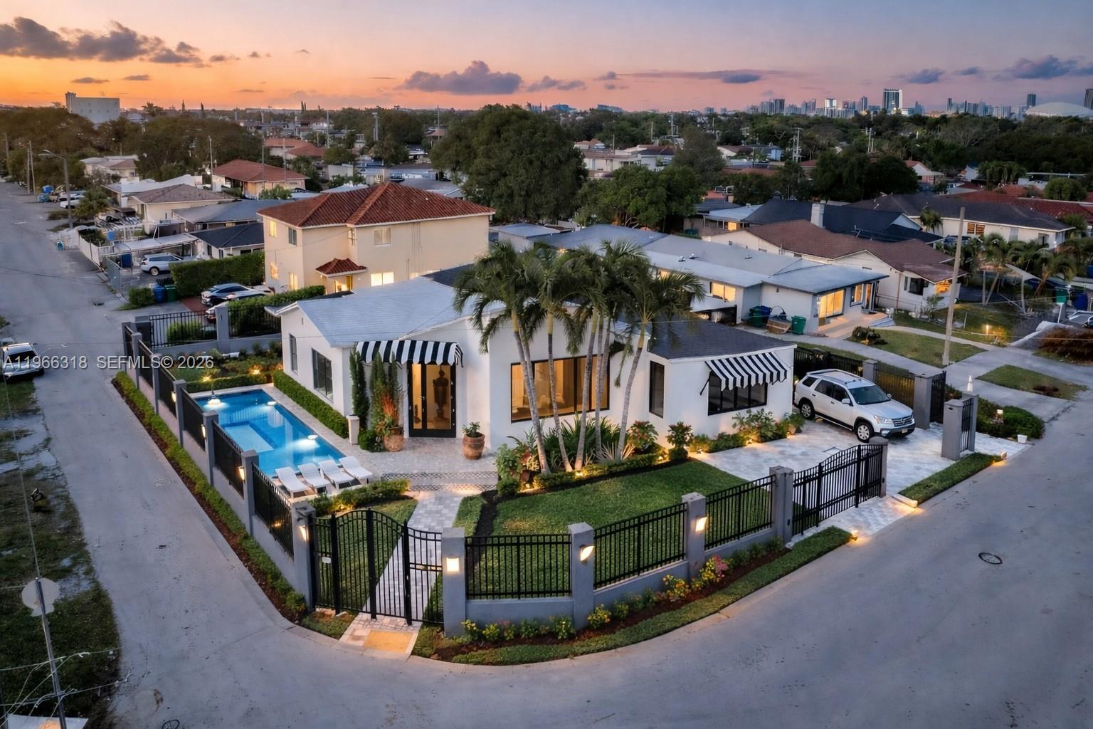 345 Southwest 36th Avenue Miami, FL 33135 - Photo 1 of 13 a view of multiple houses with outdoor space