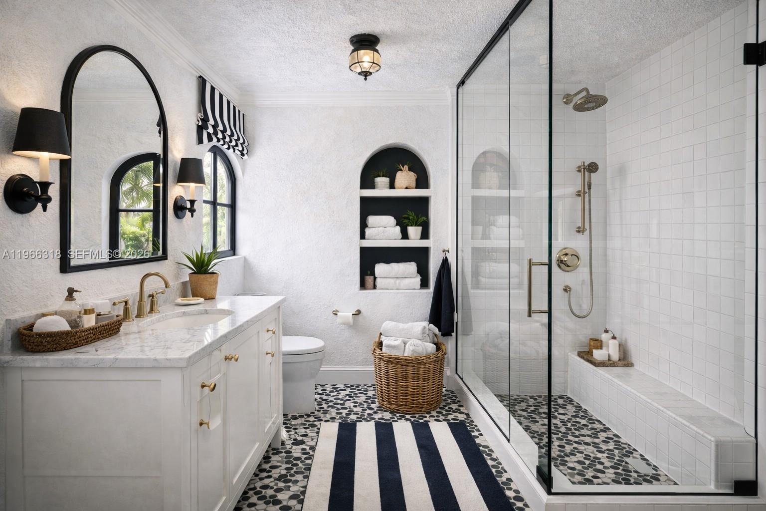 345 Southwest 36th Avenue Miami, FL 33135 - Photo 4 of 13 a bathroom with a double vanity sink and mirror