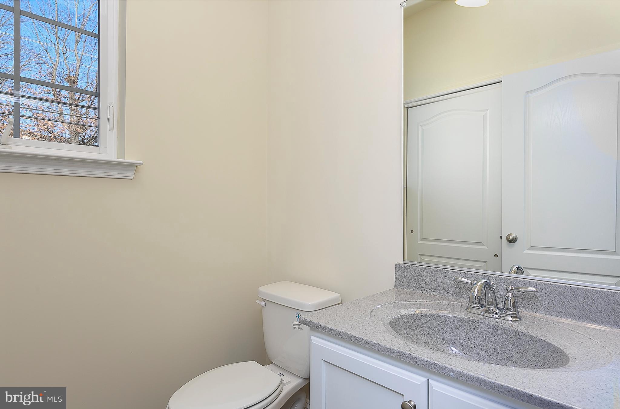 320 Grace Way Laurel, MD 20707 - Photo 11 of 26 Main Level Hall Bath