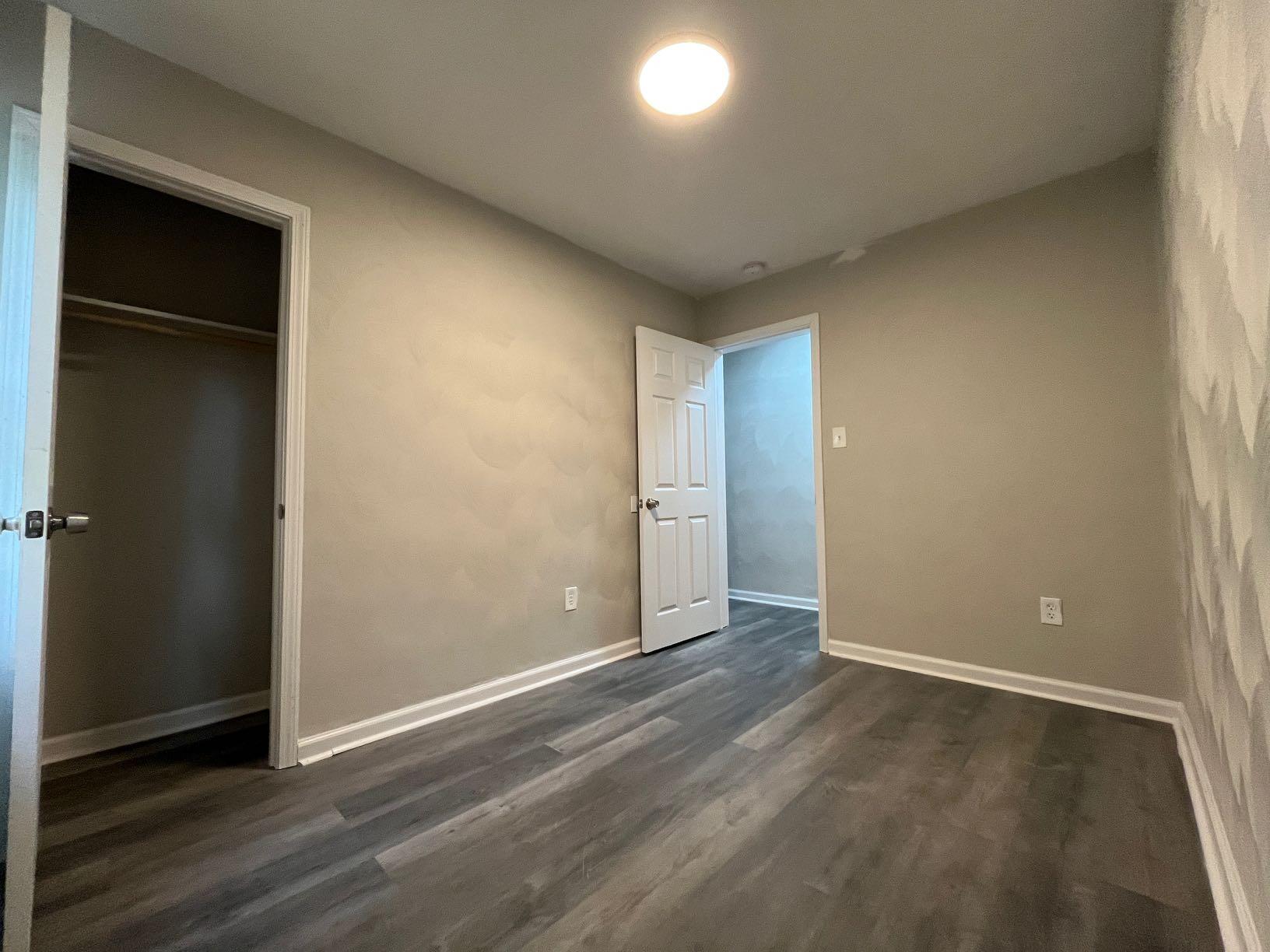 1334 Belleview Avenue Southeast Roanoke, VA 24014 - Photo 12 of 13 an empty room with wooden floor & closet area