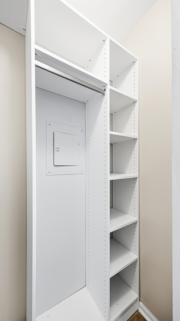 3110 North Sheridan Road, Unit 1807 Chicago, IL 60657 - Photo 13 of 21 a view of walk in closet with empty racks