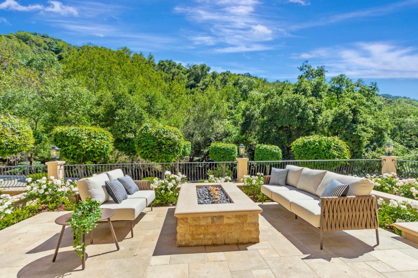 15681 Kennedy Road Los Gatos, CA 95032 - Photo 23 of 155 a view of a patio with couches table and chairs and potted plants