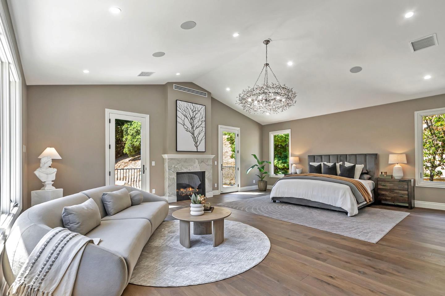 15681 Kennedy Road Los Gatos, CA 95032 - Photo 86 of 155 a living room with furniture and a chandelier