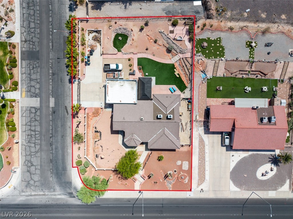 892 North Hollywood Boulevard Las Vegas, NV 89110 - Photo 75 of 81 This expansive property features a well-maintained exterior, perfect for outdoor living and entertaining.