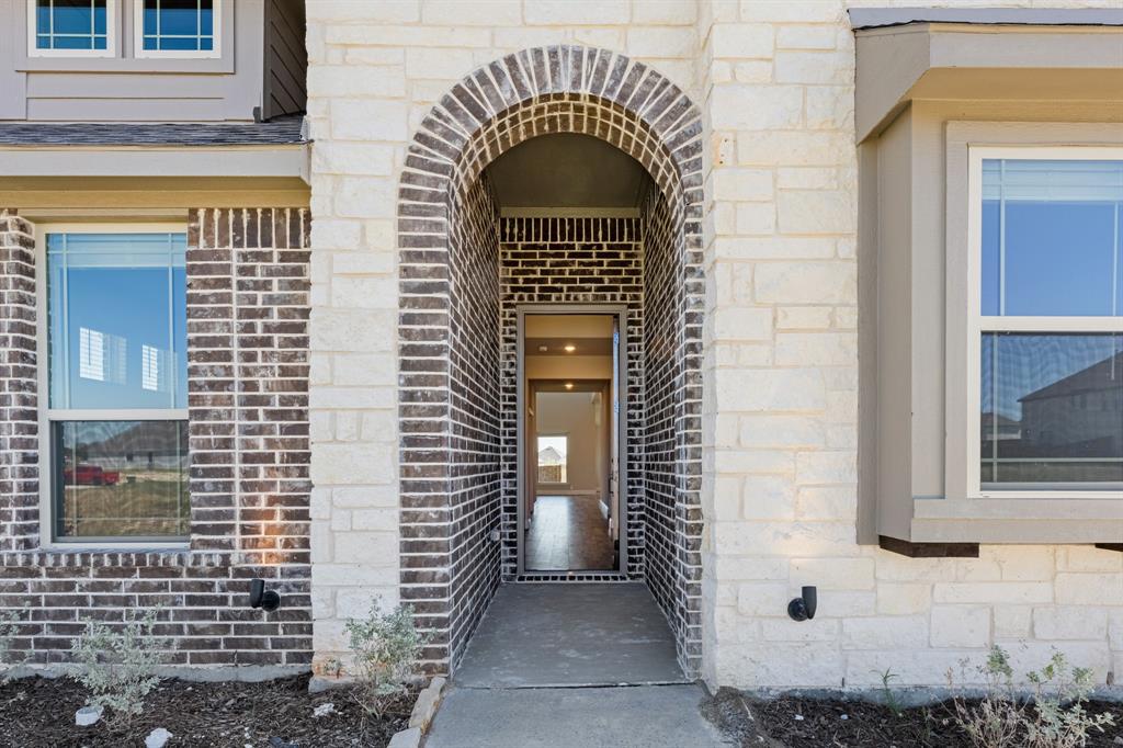 11716 Flathead Court Godley, TX 76044 - Photo 4 of 40 a view of a door of the house