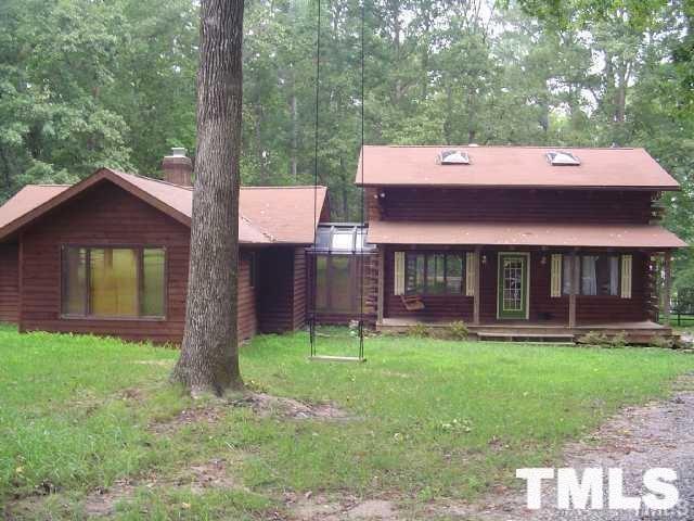 8212 Ridgeback Road Apex, NC 27523 - Photo 1 of 7 a view of a house with a yard and sitting area