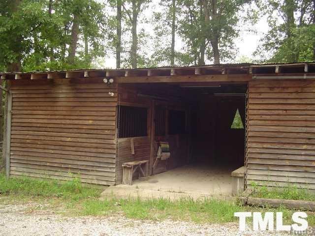 8212 Ridgeback Road Apex, NC 27523 - Photo 6 of 7 a backyard of a house