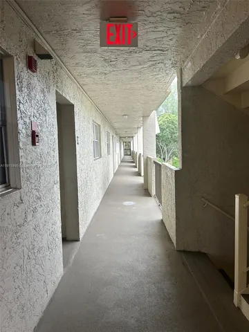 a kitchen with stainless steel appliances granite countertop a refrigerator oven a sink and dishwasher