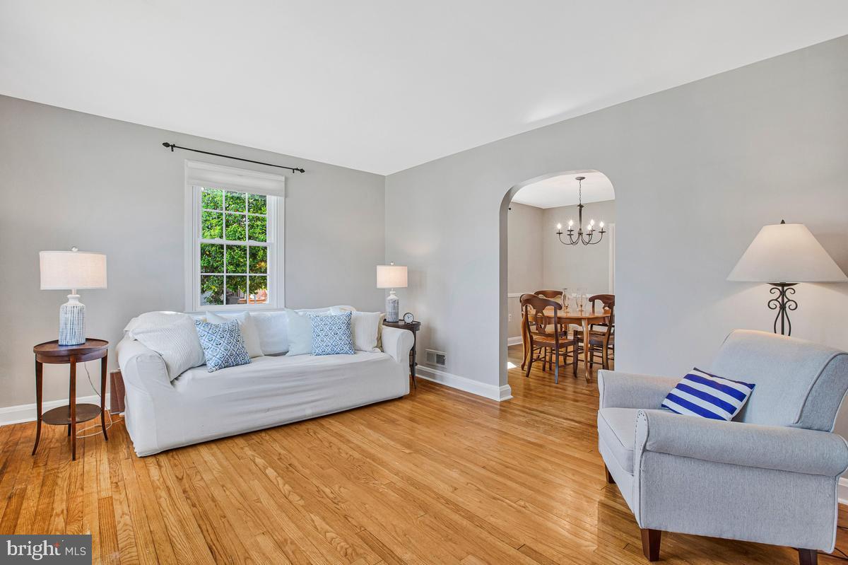 601 Forest View Road Linthicum Heights, MD 21090 - Photo 5 of 37 a living room with furniture and a wooden floor