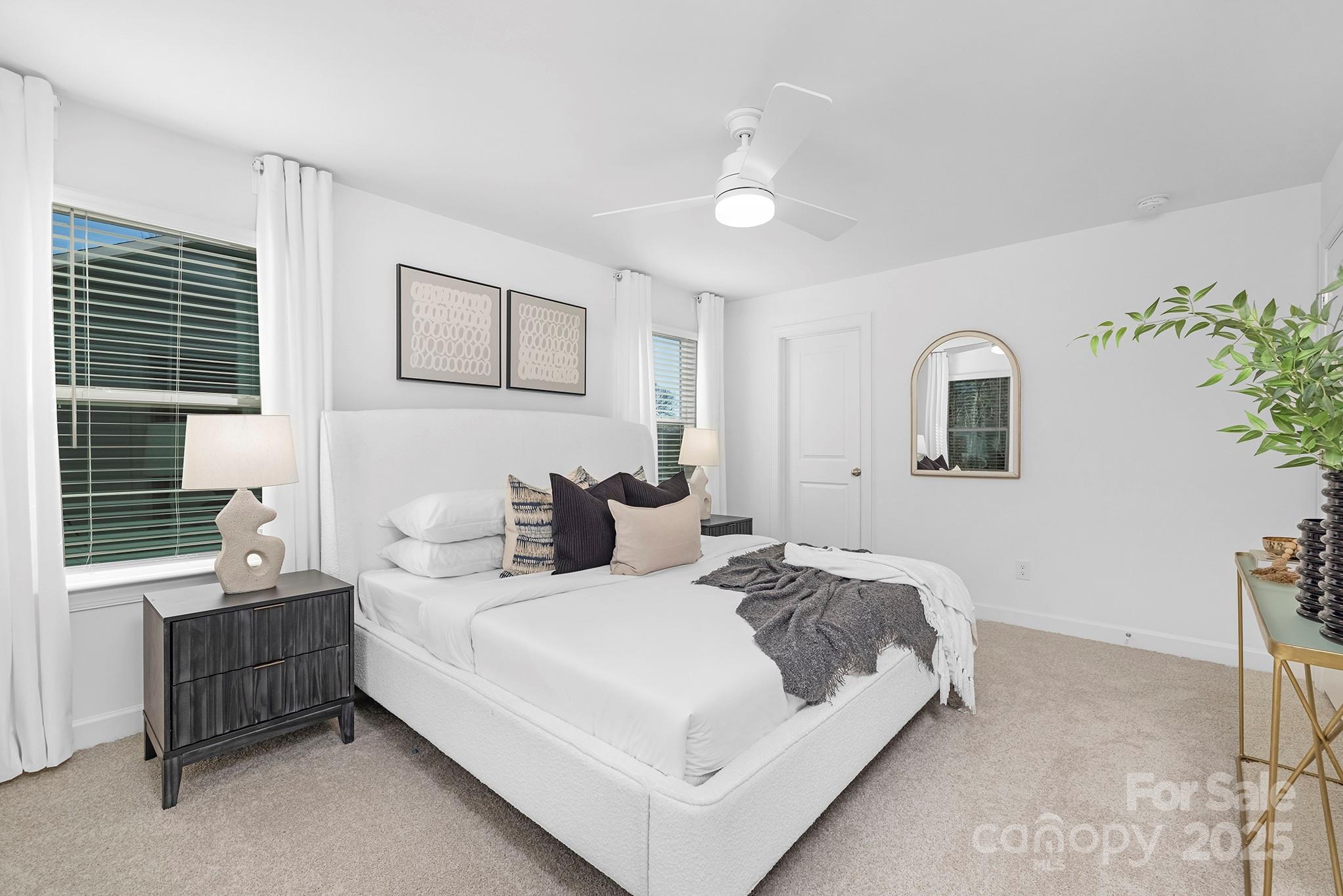 2125 Tom Sadler Road, Unit 7159 Charlotte, NC 28214 - Photo 14 of 26 a bedroom with a bed and a night stand