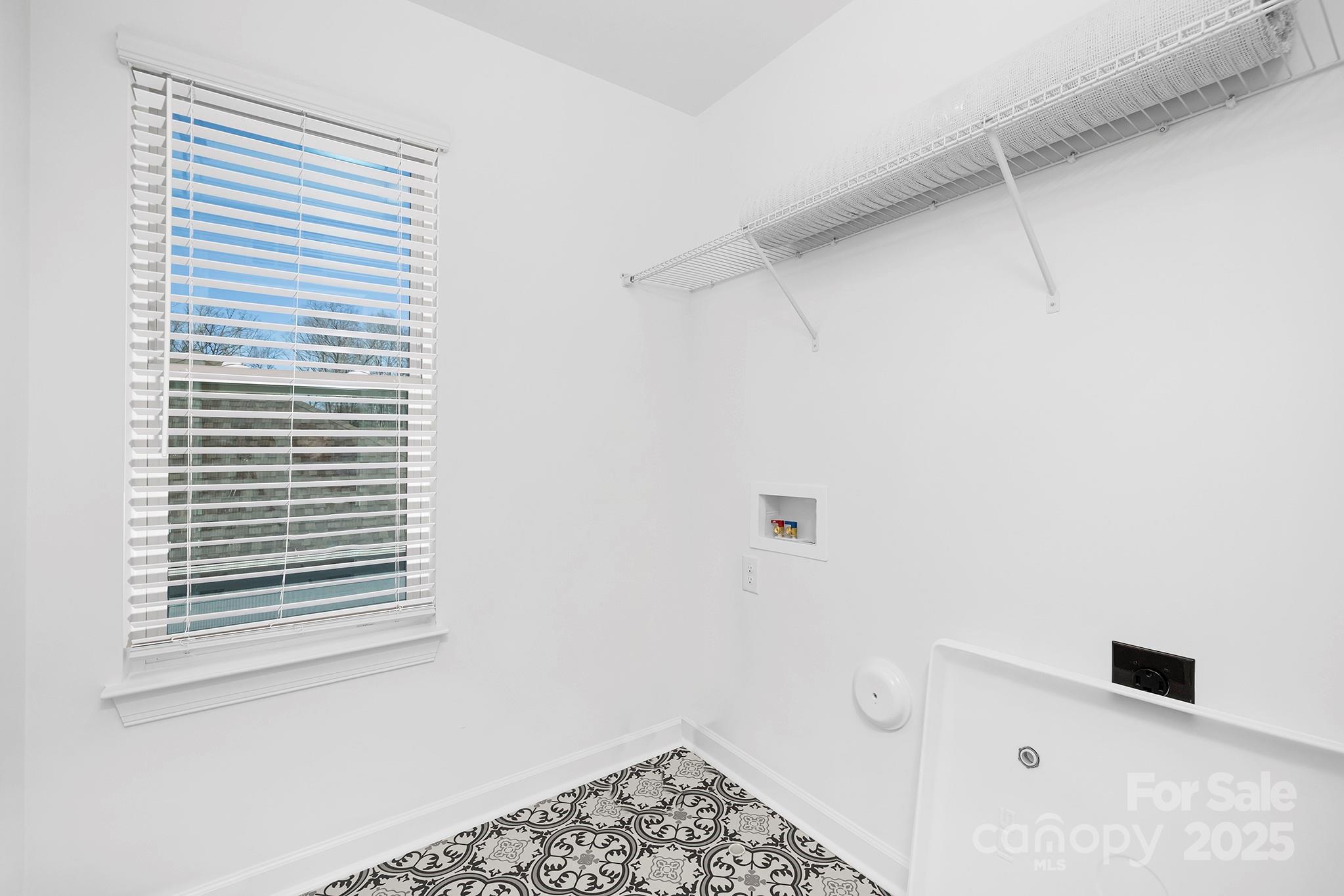 2125 Tom Sadler Road, Unit 7159 Charlotte, NC 28214 - Photo 20 of 26 a bathroom with a window