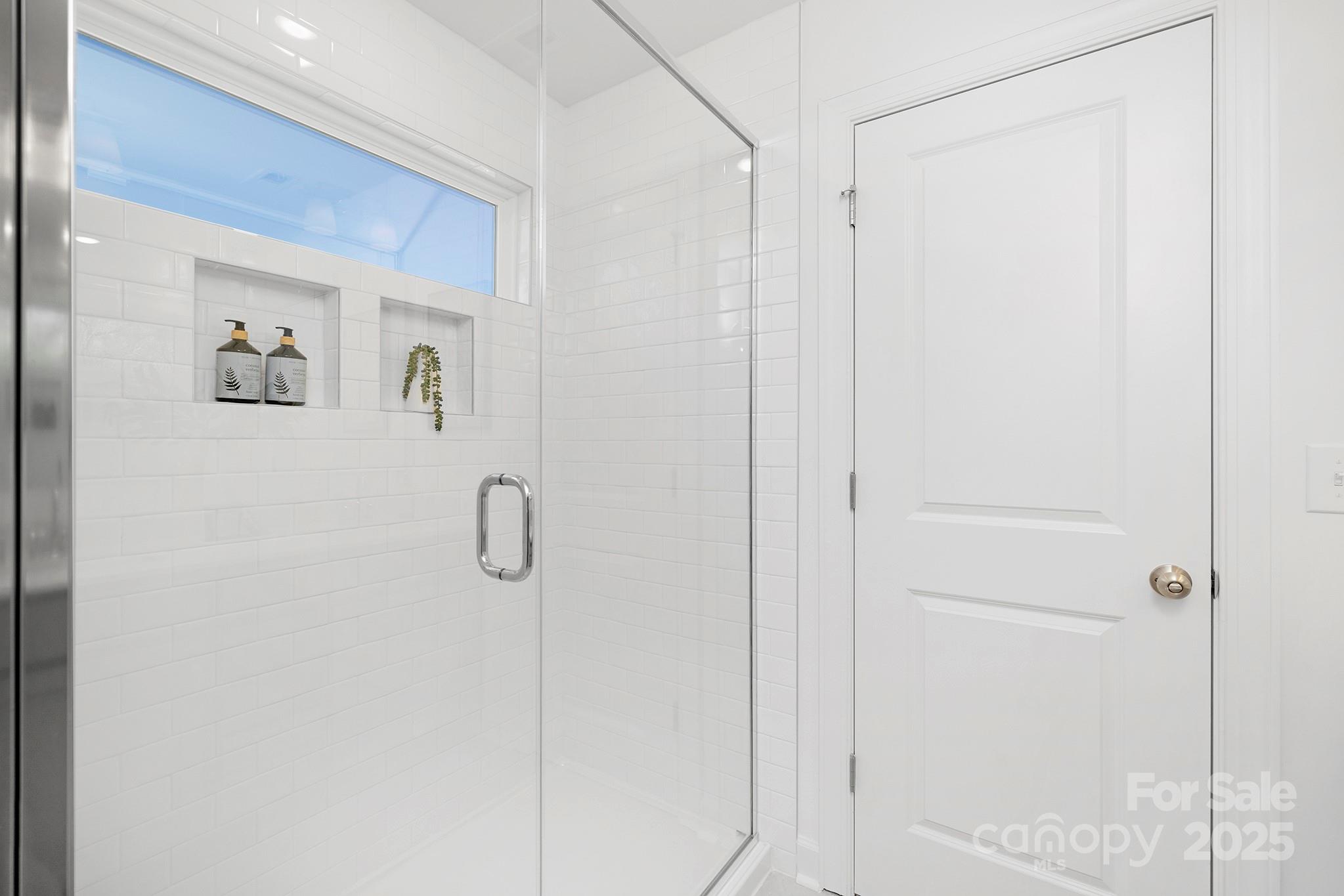 2125 Tom Sadler Road, Unit 7159 Charlotte, NC 28214 - Photo 22 of 26 a bathroom with a shower