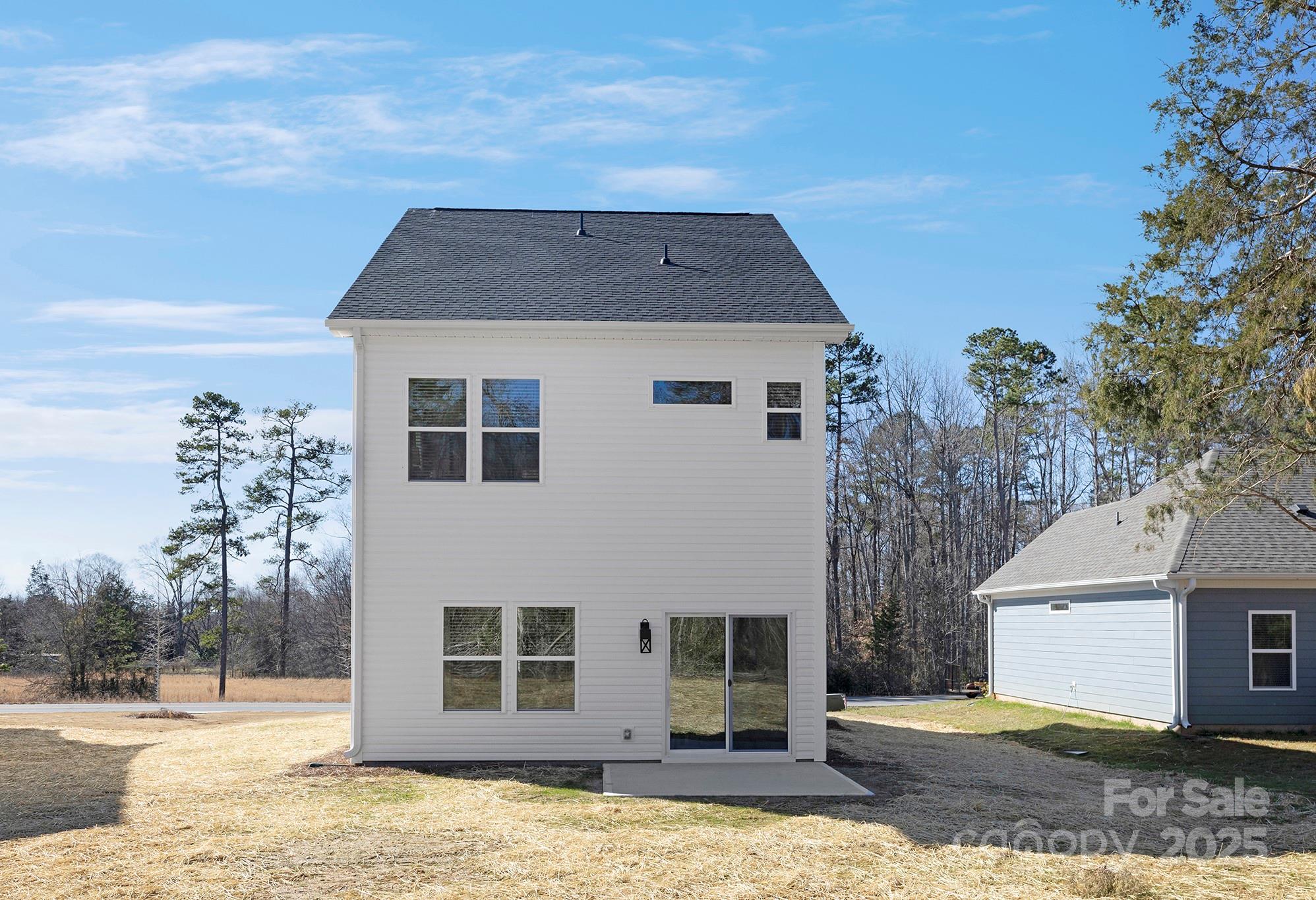 2125 Tom Sadler Road, Unit 7159 Charlotte, NC 28214 - Photo 26 of 26 a front view of a house with a yard