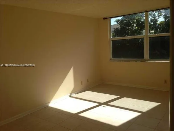 a view of a big room with wooden floor