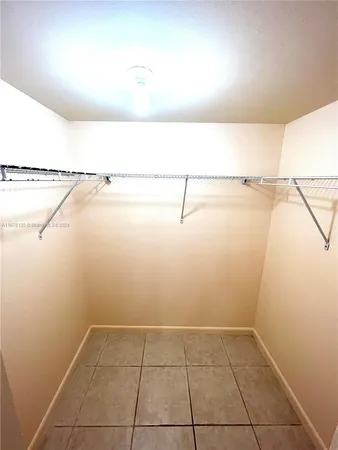 a bathroom with a sink a mirror and a bathtub