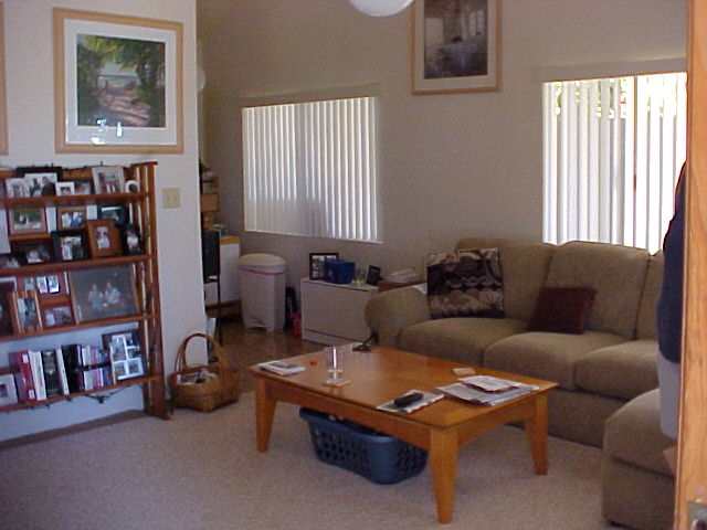 2483 Lilikoi Road Haiku, HI 96708 - Photo 3 of 4 a living room with furniture and a window