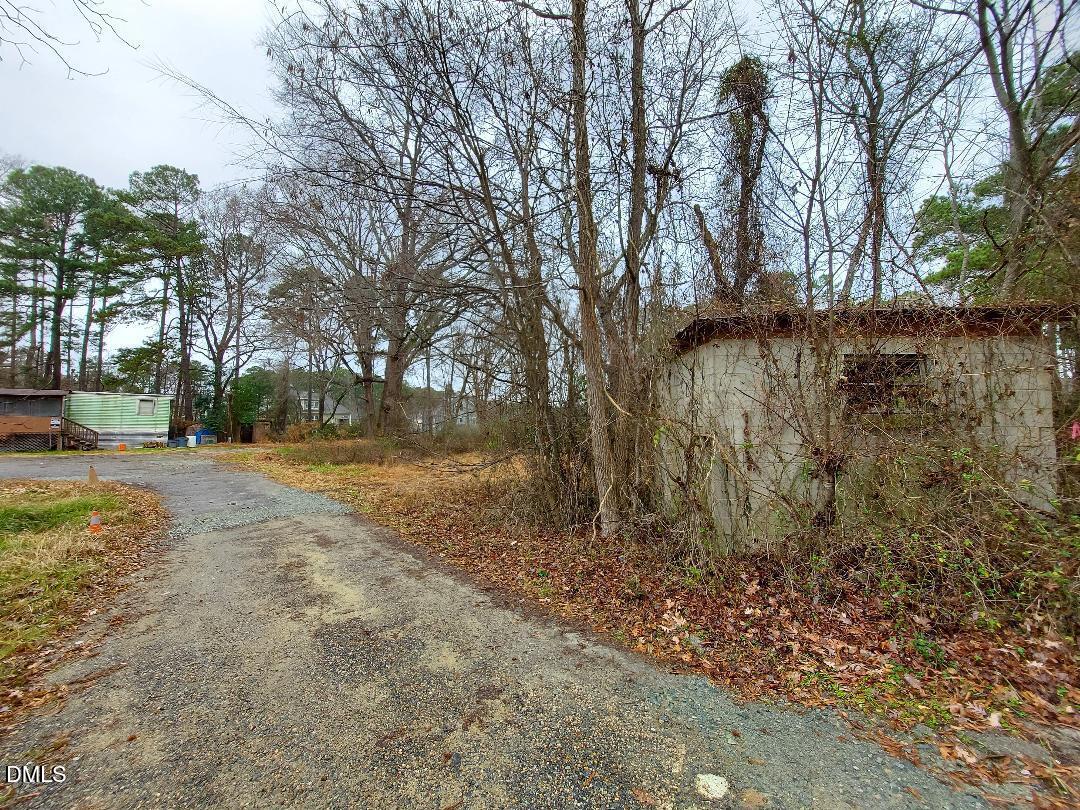 3020 Holland Road Apex, NC 27502 - Photo 17 of 19 a view of yard with green space