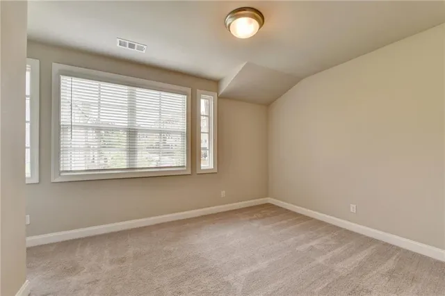 a view of a house with a garden