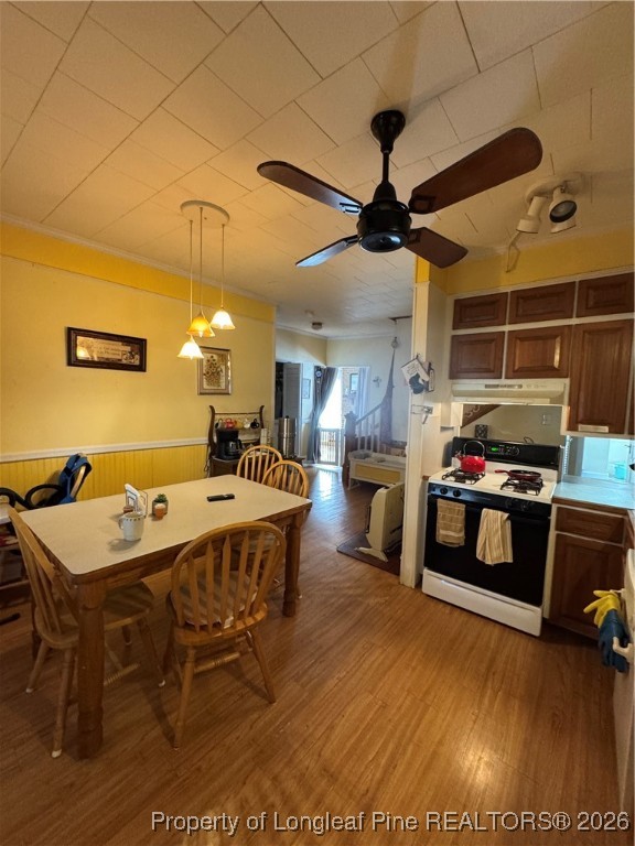 159 Zimmerman Road Sanford, NC 27330 - Photo 12 of 21 a living room with furniture a flat screen tv and kitchen view
