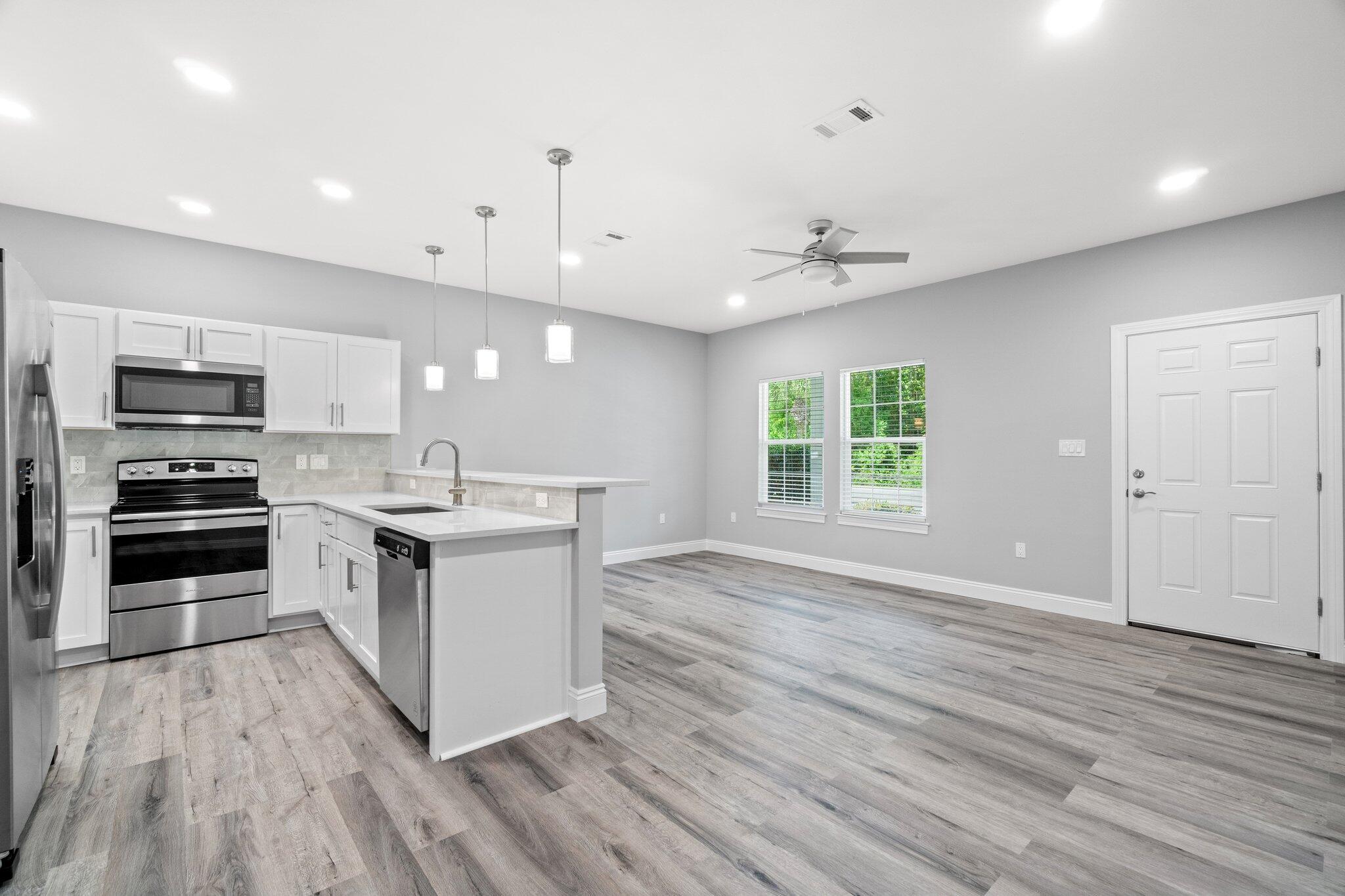 108 Don Bishop Road, Unit 63 Santa Rosa Beach, FL 32459 - Photo 3 of 23 kitchen-living room 3