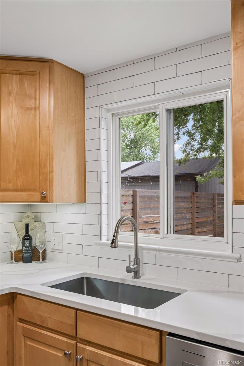 2255 Meade Street Denver, CO 80211 - Photo 11 of 30 a kitchen with a sink and a window