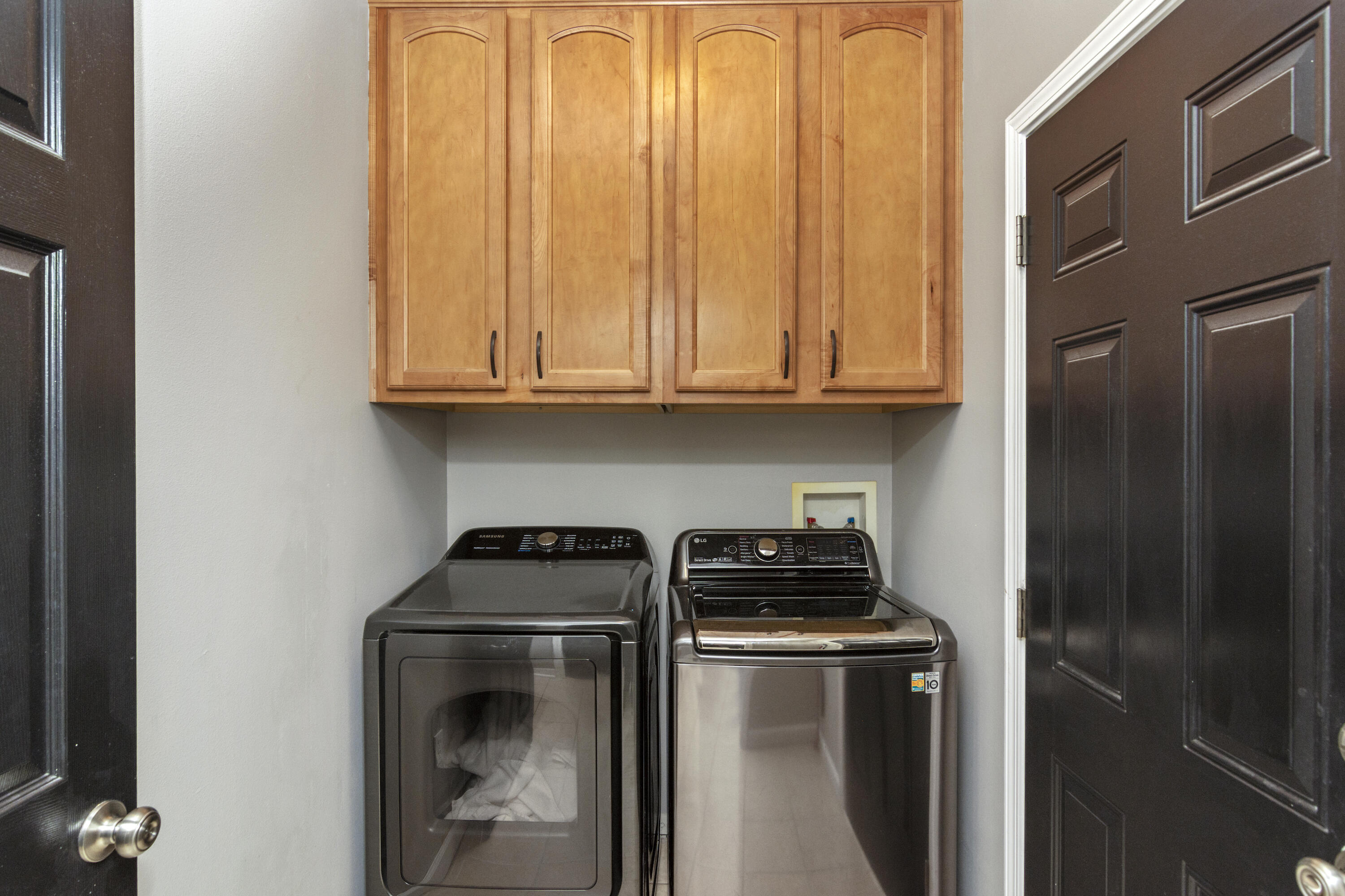 4631 Hermosa Road Crestview, FL 32539 - Photo 42 of 42 a kitchen with granite countertop a stove and a refrigerator