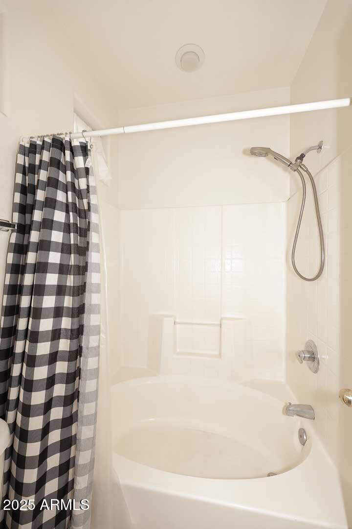 2710 East Chester Drive Chandler, AZ 85286 - Photo 14 of 28 a bathroom with a bathtub and shower
