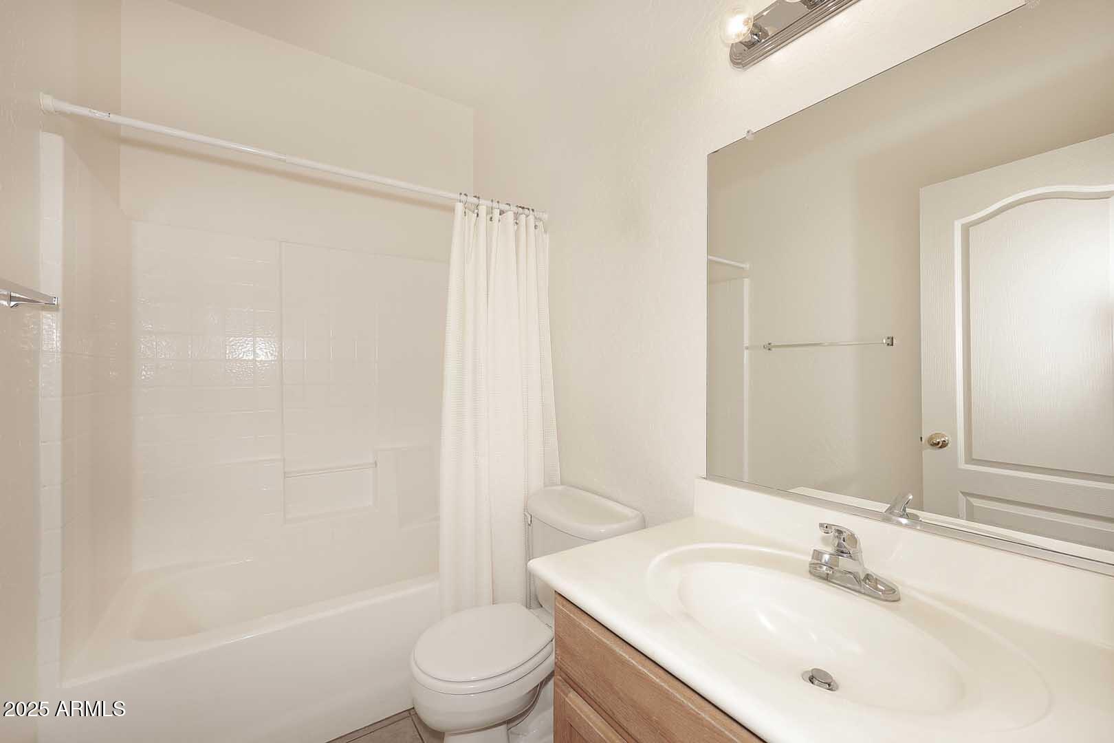 2710 East Chester Drive Chandler, AZ 85286 - Photo 18 of 28 a bathroom with a sink toilet and shower